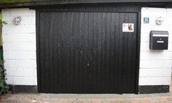 Udskiftning af gammel garageport, efter billed.